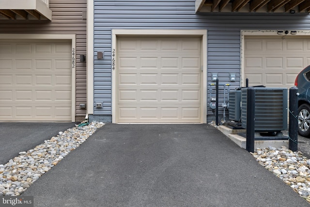 garage featuring central air condition unit