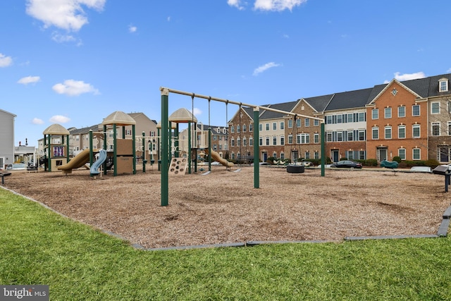 view of jungle gym featuring a lawn