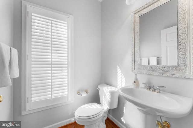 bathroom with sink and toilet