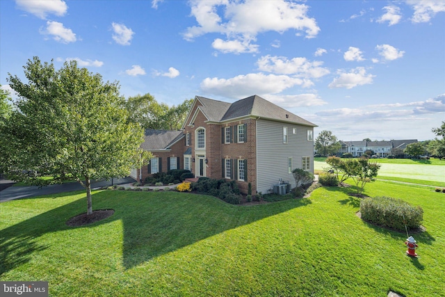 view of home's exterior with a lawn