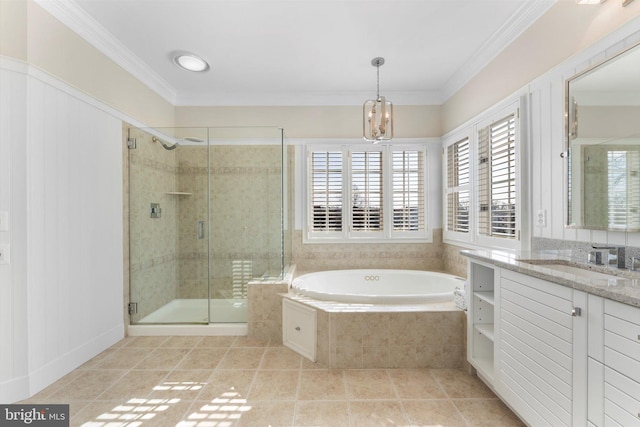 bathroom featuring crown molding, vanity, plus walk in shower, and tile patterned flooring