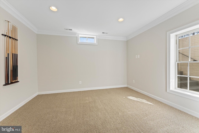 carpeted empty room with crown molding