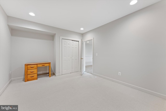 carpeted bedroom with a closet