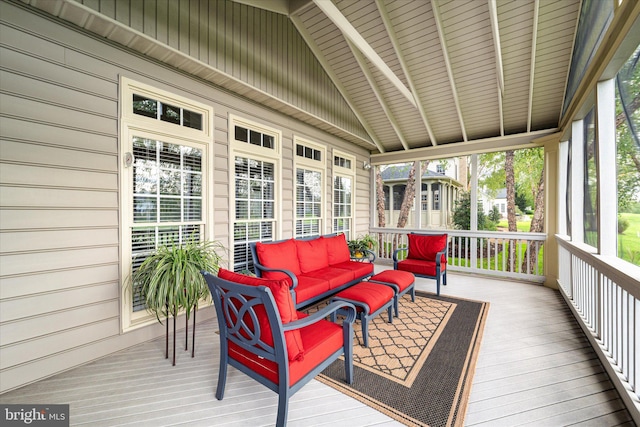 sunroom / solarium with lofted ceiling