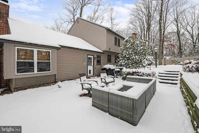 view of snow covered deck