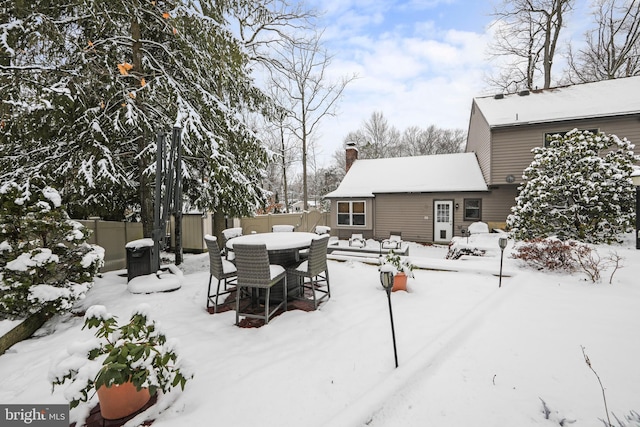 view of yard covered in snow