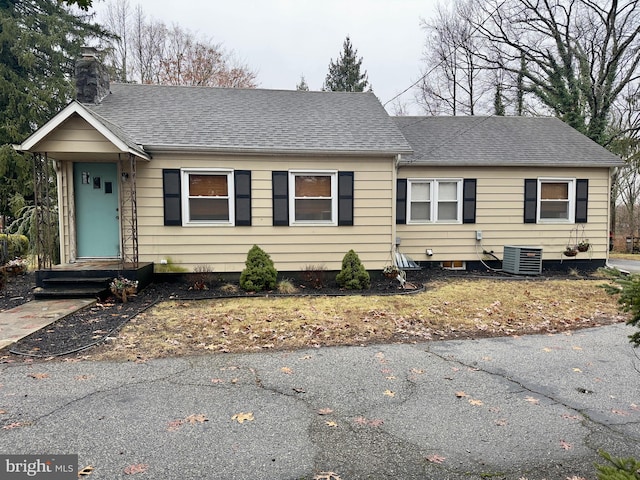 view of front of home featuring cooling unit