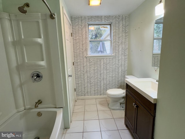 full bathroom featuring vanity, shower / bathing tub combination, and toilet