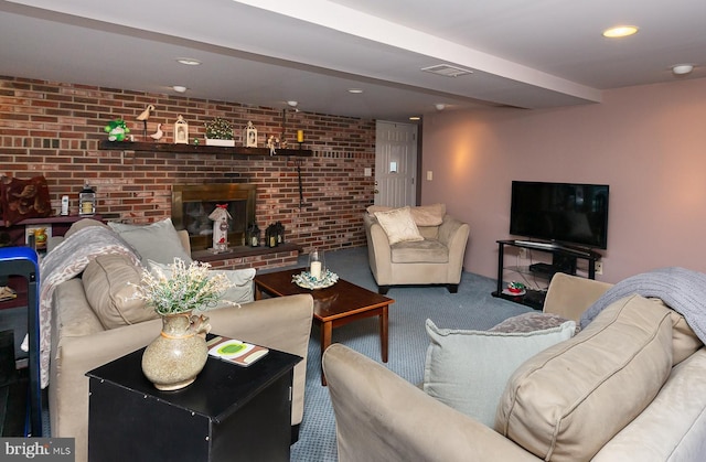 carpeted living room with brick wall and a fireplace