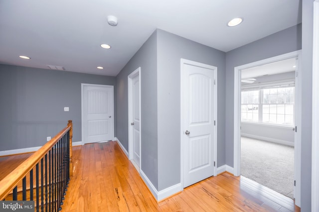 hallway featuring light wood-type flooring