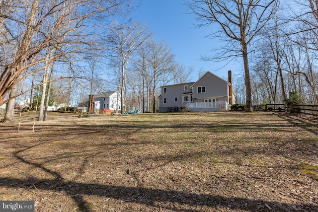 view of yard with fence