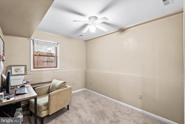 office featuring light colored carpet and ceiling fan