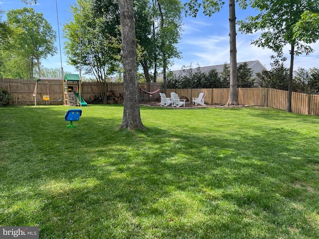 view of yard with a playground