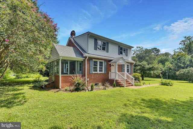 view of front facade with a front yard