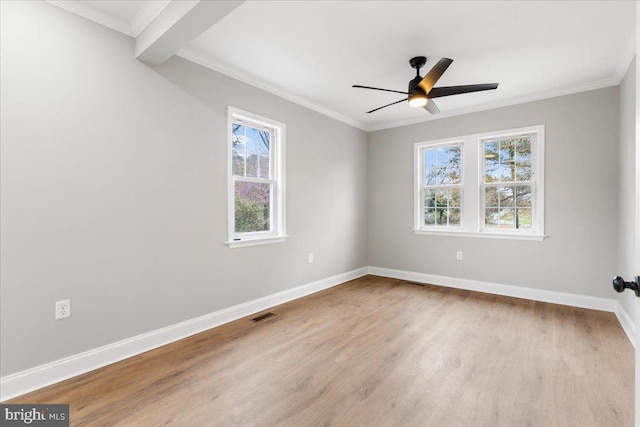 unfurnished room featuring ornamental molding, light hardwood / wood-style floors, and ceiling fan