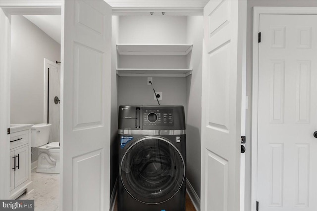 laundry room with washer / clothes dryer