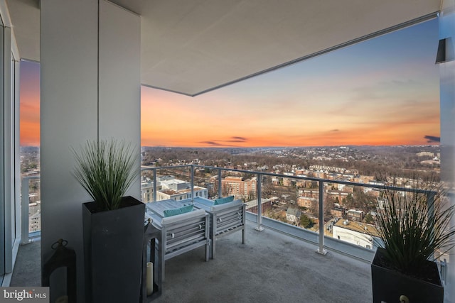 view of balcony at dusk