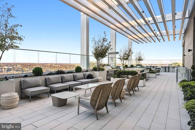 view of patio / terrace with an outdoor hangout area and a pergola