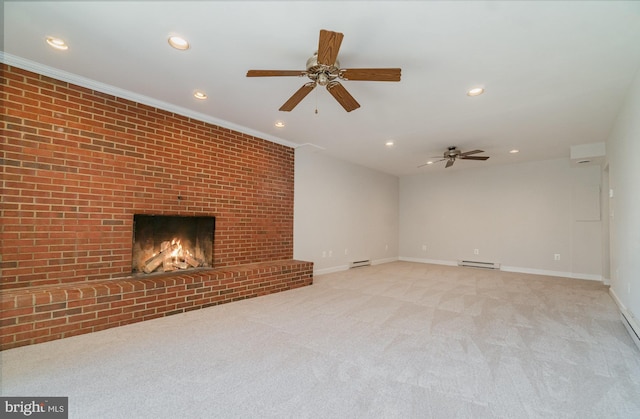 unfurnished living room with light carpet, a brick fireplace, crown molding, and a baseboard radiator