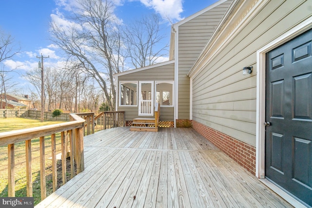 wooden terrace with a sunroom