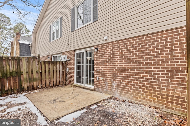 rear view of house featuring a patio