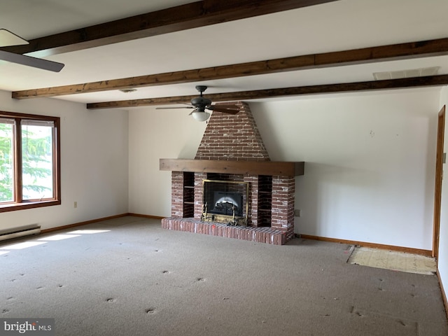 unfurnished living room featuring a brick fireplace, carpet floors, vaulted ceiling with beams, and ceiling fan