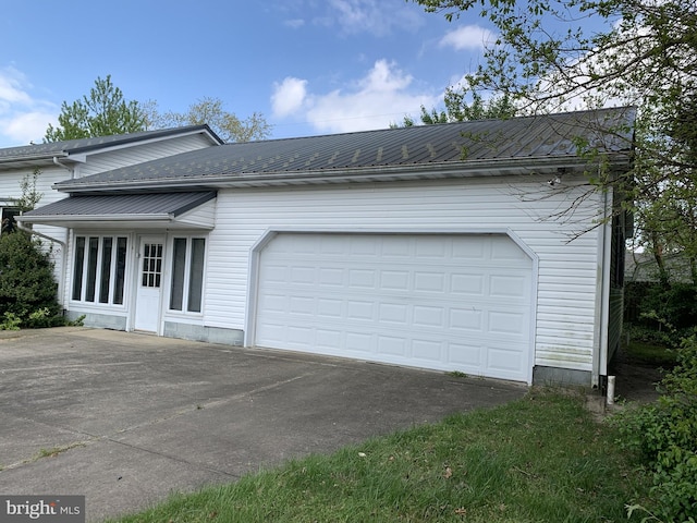 ranch-style house featuring a garage