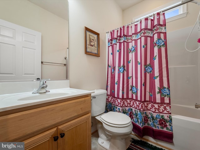 full bathroom featuring vanity, shower / tub combo, and toilet