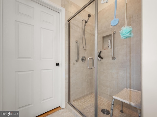 bathroom with an enclosed shower