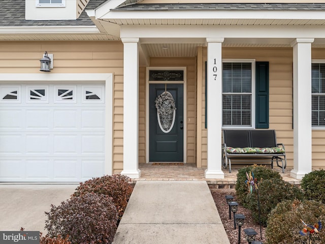 entrance to property with a porch