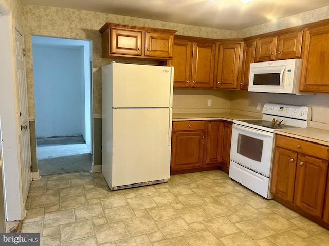 kitchen featuring white appliances