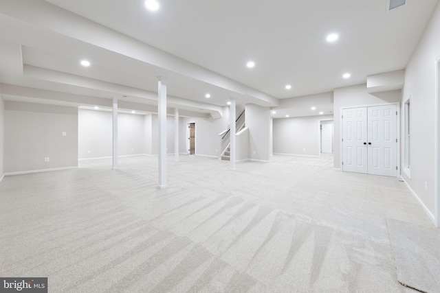 basement with light carpet