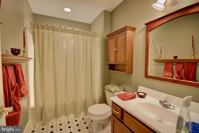 full bathroom with vanity, shower / bathtub combination with curtain, and toilet