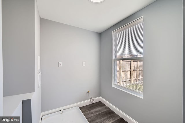 1631 N Montford Ave, Baltimore, MD 21213 - laundry room featuring baseboards, hookup for a gas dryer, laundry area, and dark wood-style floors