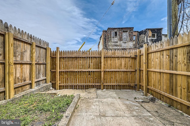 1631 N Montford Ave, Baltimore, MD 21213 - view of patio featuring fence