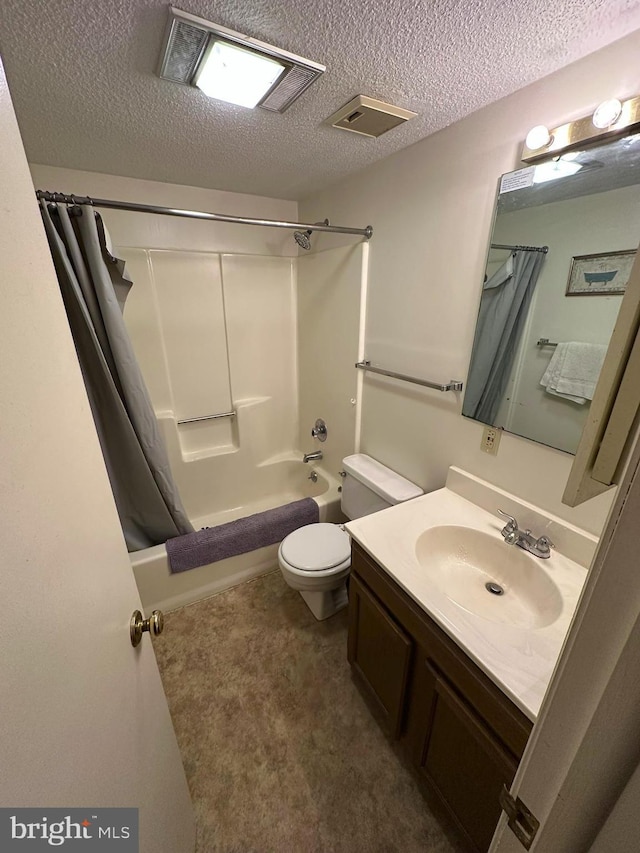 full bathroom featuring vanity, shower / bathtub combination with curtain, a textured ceiling, and toilet