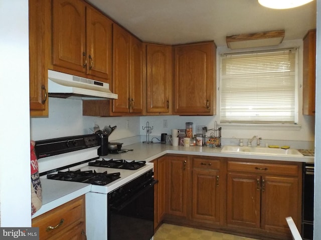 kitchen with sink and gas stove