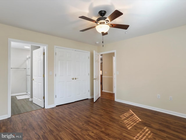 unfurnished bedroom featuring dark hardwood / wood-style floors and ceiling fan