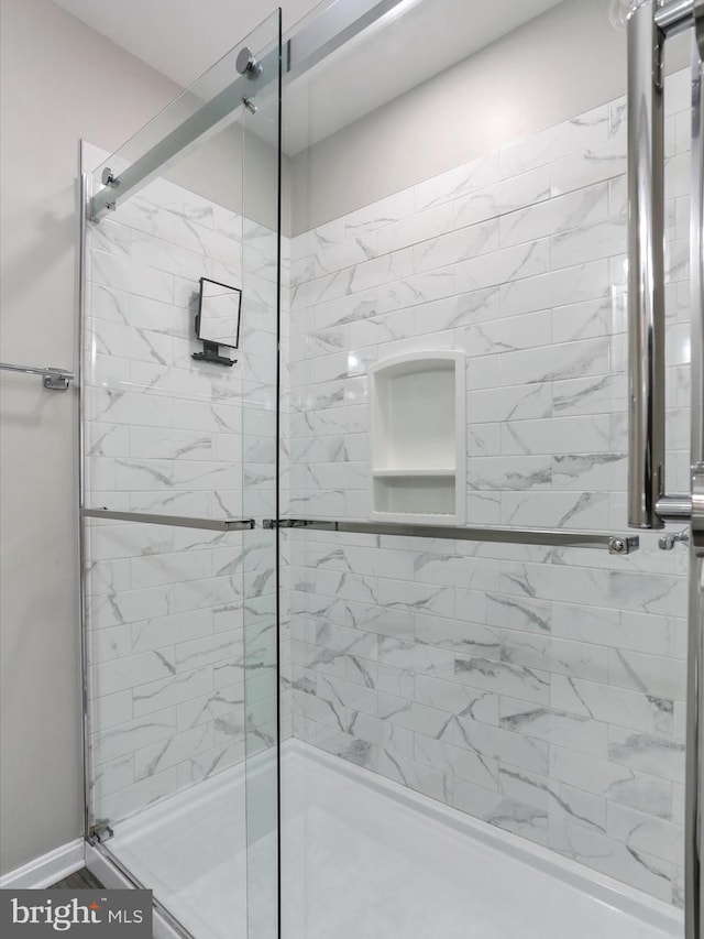 bathroom with an enclosed shower