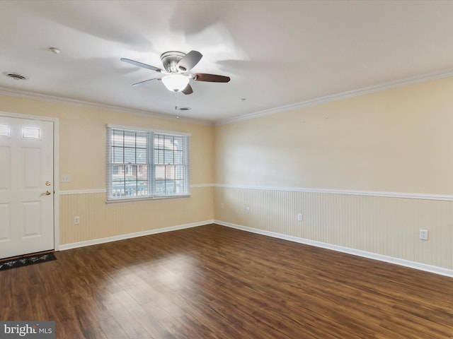 entryway with crown molding, ceiling fan, and dark hardwood / wood-style flooring