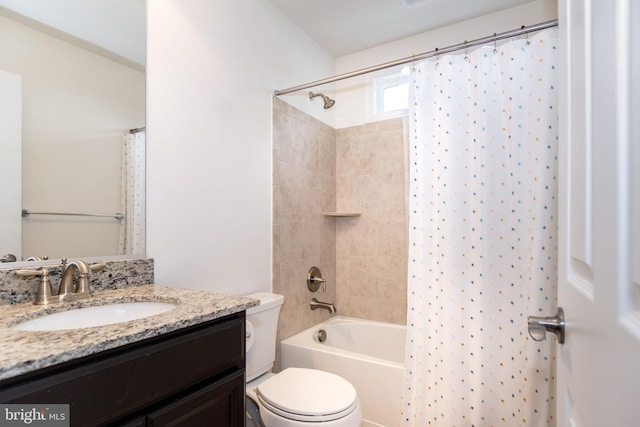 full bathroom with shower / bathtub combination with curtain, vanity, and toilet