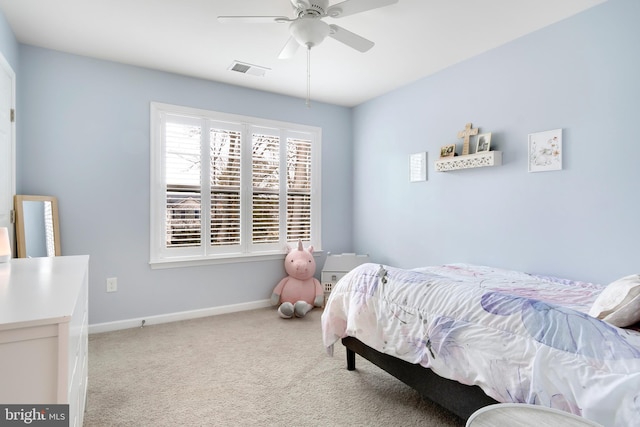 bedroom with light colored carpet and ceiling fan