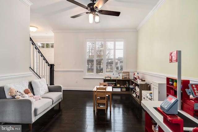 home office with ornamental molding, dark hardwood / wood-style floors, and ceiling fan