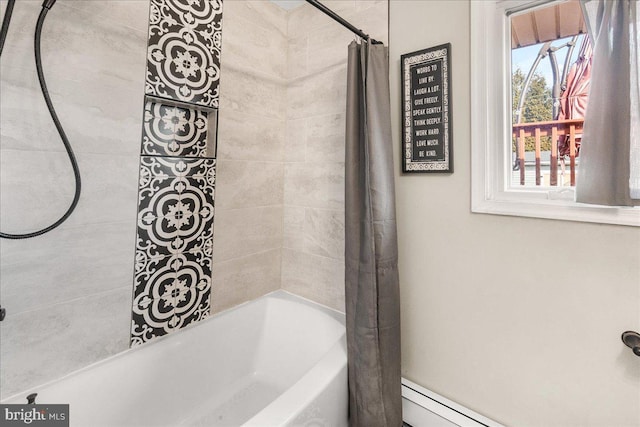 bathroom featuring baseboard heating and shower / tub combo