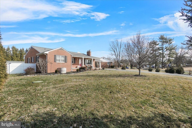 view of home's exterior with a yard