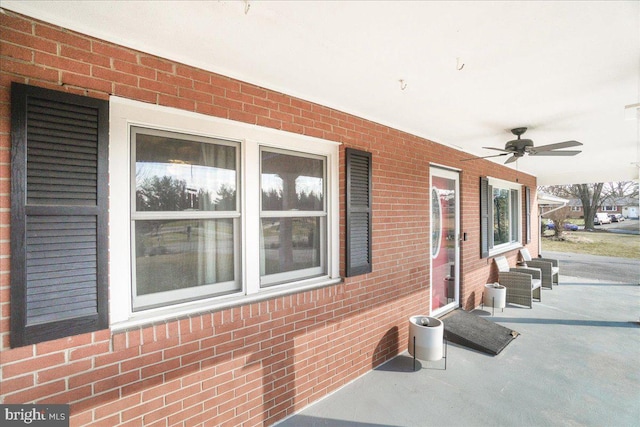 view of property exterior featuring ceiling fan