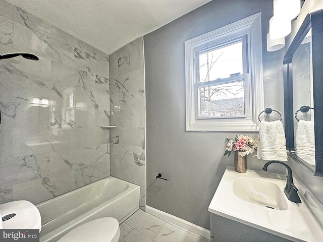 full bathroom featuring vanity, toilet, and tiled shower / bath combo