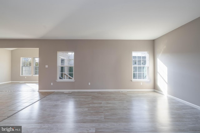 unfurnished room featuring light wood-type flooring