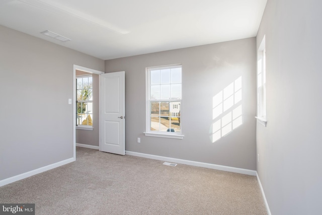 view of carpeted spare room