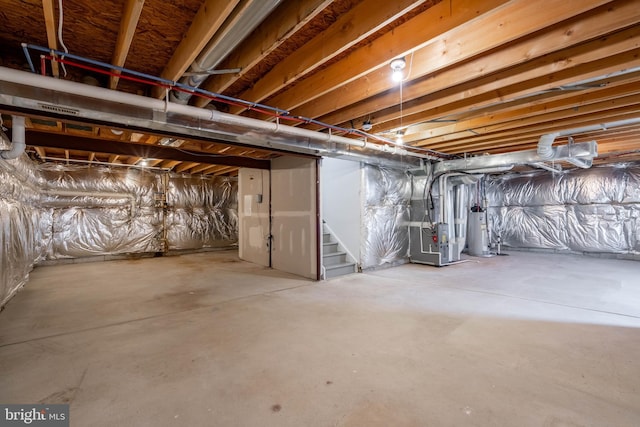 basement with heating unit and gas water heater